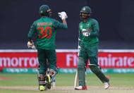 CARDIFF, WALES - JUNE 09: Bangladesh batsmen Shakib Al Hasan (l) and Mohammad Mahmudullah celebrate after Hasan had reached his century during their partnership during the ICC Champions Trophy match between New Zealand and Bangladesh at SWALEC Stadium on June 9, 2017 in Cardiff, Wales. (Photo by Stu Forster/Getty Images)
