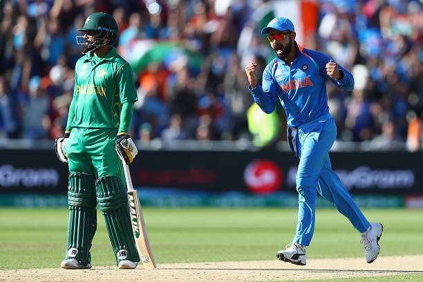 BIRMINGHAM, ENGLAND - JUNE 04:  Virat Kohli of India celebrates as Ravindra Jadeja  captures the wicket of Azhar Ali of Pakistan during the ICC Champions Trophy match between India and Pakistan at Edgbaston on June 4, 2017 in Birmingham, England.  (Photo by Michael Steele/Getty Images)