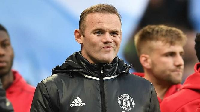 Giggs: Rooney could stay at Manchester United