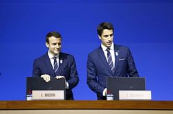 Macron says Paris 2024 Olympic bid embodies "threatened" values