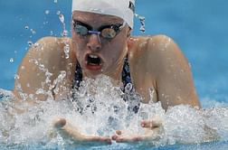 King and Efimova move closer to Olympic grudge rematch