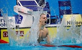 Dressel shines again in "crazy" heats
