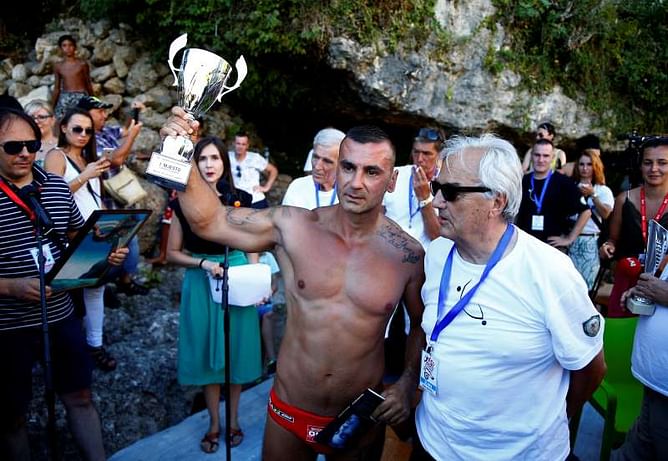 For Mostar bridge-diving champion, success takes more than gravity