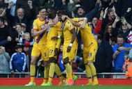 LIVERPOOL, ENGLAND - APRIL 23: Christian Benteke (2nd L) of Crystal Palace celebrates his side's second goal with his team mates during the Premier League match between Liverpool and Crystal Palace at Anfield on April 23, 2017 in Liverpool, England. (Photo by Laurence Griffiths/Getty Images)