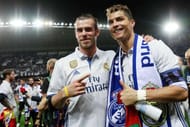 MALAGA, SPAIN - MAY 21: Cristiano Ronaldo of Real Madrid and Gareth Bale of Real Madrid celebrate after their team are crowned champions following the La Liga match between Malaga and Real Madrid at La Rosaleda Stadium on May 21, 2017 in Malaga, Spain. (Photo by Gonzalo Arroyo Moreno/Getty Images)