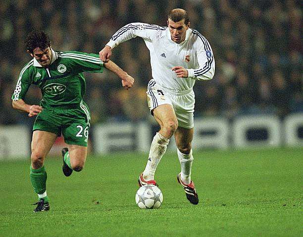 4 Dec 2001:  Zinedine Zidane of Real Madrid takes on Giorgios Karagounis of Panathinaikos during the UEFA Champions League Second Phase Group C match between Real Madrid and Panathinaikos at the Bernabeu in Madrid, Spain. \ Mandatory Credit: Michael Steele /Allsport