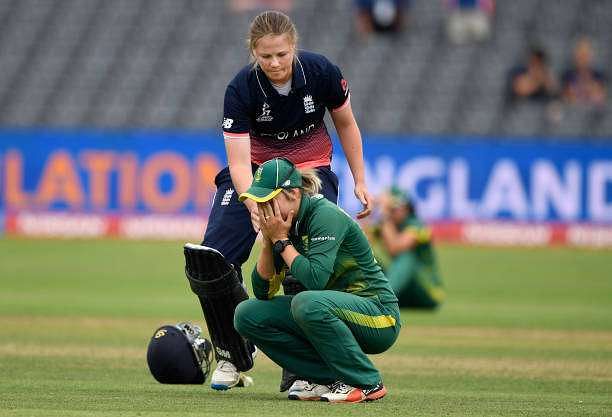 BRISTOL, ENGLAND - JULY 18:  England batsman Anya Shrubsole goes over to console South Africa captain Dane van Niekerk during the ICC Women&#039;s World Cup 2017 Semi-Final between England and South Africa at The County Ground on July 18, 2017 in Bristol, England.  (Photo by Stu Forster/Getty Images)