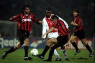 1995: Finidi George of Aiax is stopped by the Milan defence during the Champions League at the Amsterdam Arena in Amsterdam, Netherlands. Ajax won the game 2-0. \ Mandatory Credit: Allsport UK /Allsport