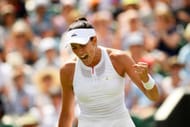 LONDON, ENGLAND - JULY 10: Garbine Muguruza of Spain celebrates during the Ladies Singles fourth round match against Angelique Kerber of Germany on day seven of the Wimbledon Lawn Tennis Championships at the All England Lawn Tennis and Croquet Club on July 10, 2017 in London, England. (Photo by Shaun Botterill/Getty Images)