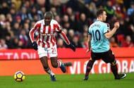 STOKE ON TRENT, ENGLAND - DECEMBER 03: Gianelli Imbula of Stoke City evades Ashley Barnes of Burnley during the Premier League match between Stoke City and Burnley at Bet365 Stadium on December 3, 2016 in Stoke on Trent, England. (Photo by Gareth Copley/Getty Images)