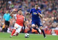 LONDON, ENGLAND - MAY 07: Henrikh Mkhitaryan of Manchester United is tackled by Alex Oxlade-Chamberlain of Arsenal during the Premier League match between Arsenal and Manchester United at Emirates Stadium on May 7, 2017 in London, England. (Photo by Richard Heathcote/Getty Images)