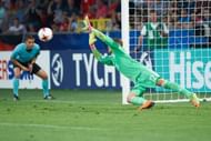 TYCHY, POLAND - JUNE 27: Jannik Pollersbeck of Germany saves England's fifth penalty during the UEFA European Under-21 Championship Semi Final match between England and Germany at Tychy Stadium on June 27, 2017 in Tychy, Poland. (Photo by Lukasz Szelag/Getty Images)