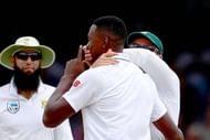 LONDON, ENGLAND - JULY 09: Kagiso Rabada of South Africa gestures and has his mouth covered by Dean Elgar after dismissing Ben Stokes of England on day four of the 1st Investec Test match between England and South Africa at Lord's Cricket Ground on July 9, 2017 in London, England. (Photo by Clive Rose/Getty Images)