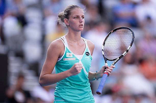 SYDNEY, AUSTRALIA - JANUARY 15:  Karolina Pliskova of Czech Republic celebrates after winning a point in her semi final match against Angelque Kerber of German during day five of the Sydney International at Sydney Olympic Park Tennis Centre on January 15, 2015 in Sydney, Australia.  (Photo by Brett Hemmings/Getty Images)