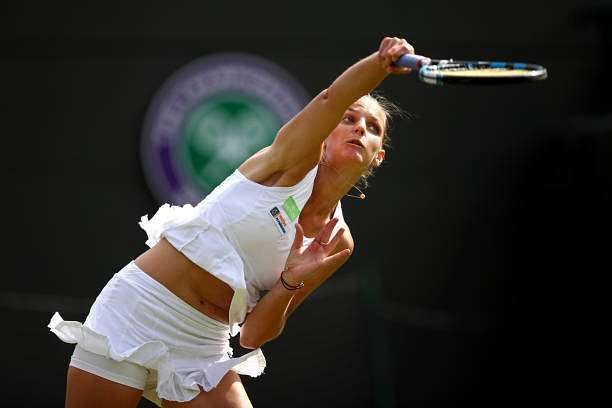 LONDON, ENGLAND - JULY 04: Karolina Pliskova of the Czech Republic serves during the Ladies Singles first round match against Evgeniya Rodina of Russia on day two of the Wimbledon Lawn Tennis Championships at the All England Lawn Tennis and Croquet Club on July 4, 2017 in London, England.  (Photo by Julian Finney/Getty Images)