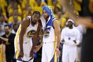 OAKLAND, CA - JUNE 12: Kevin Durant #35 and Stephen Curry #30 of the Golden State Warriors discuss the play against the Cleveland Cavaliers during the second half in Game 5 of the 2017 NBA Finals at ORACLE Arena on June 12, 2017 in Oakland, California. NOTE TO USER: User expressly acknowledges and agrees that, by downloading and or using this photograph, User is consenting to the terms and conditions of the Getty Images License Agreement. (Photo by Ezra Shaw/Getty Images)
