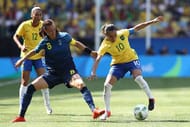 RIO DE JANEIRO, BRAZIL - AUGUST 16: Lotta Schelin of Sweden and Marta of Brazil in action during the Women's Football Semi Final between Brazil and Sweden on Day 11 of the Rio 2016 Olympic Games at Maracana Stadium on August 16, 2016 in Rio de Janeiro, Brazil. (Photo by Buda Mendes/Getty Images)