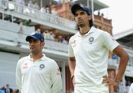 LONDON, ENGLAND - JULY 21: Mahendra Singh Dhoni and Ishant Sharma of India watch the presentations after day five of 2nd Investec Test match between England and India at Lord's Cricket Ground on July 21, 2014 in London, United Kingdom. (Photo by Gareth Copley/Getty Images)