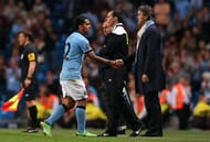 MANCHESTER, ENGLAND - MAY 07: Manchester City Manager Roberto Mancini shakes hands with Carlos Tevez as he is substituted during the Barclays Premier League match between Manchester City and West Bromwich Albion at the Etihad Stadium on May 07, 2013 in Manchester, England. (Photo by Alex Livesey/Getty Images)