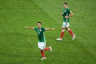 SOCHI, RUSSIA - JUNE 29: Marco Fabian of Mexico celebrates scoring his sides first goal with Javier Hernandez of Mexico during the FIFA Confederations Cup Russia 2017 Semi-Final between Germany and Mexico at Fisht Olympic Stadium on June 29, 2017 in Sochi, Russia. (Photo by Matthias Hangst/Getty Images)