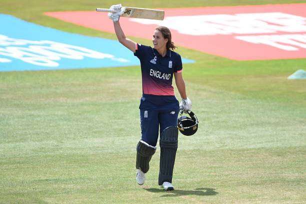 DERBY, ENGLAND - JULY 12: Natalie Sciver of England raises her bat after scoring one hundred runs during the ICC Women&#039;s World Cup 2017 between England and New Zealand at The 3aaa County Ground on July 12, 2017 in Derby, England. (Photo by Nathan Stirk/Getty Images)