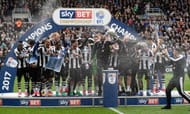NEWCASTLE UPON TYNE, ENGLAND - MAY 07: Newcastle United celebrate after winning the Sky Bet Championship match between Newcastle United and Barnsley at St James' Park on May 7, 2017 in Newcastle upon Tyne, England. (Photo by Stu Forster/Getty Images)