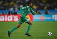 DURBAN, SOUTH AFRICA - JUNE 22: Nwankwo Kanu of Nigeria runs with the ball during the 2010 FIFA World Cup South Africa Group B match between Nigeria and South Korea at Durban Stadium on June 22, 2010 in Durban, South Africa. (Photo by Laurence Griffiths/Getty Images)