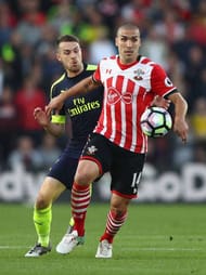 SOUTHAMPTON, ENGLAND - MAY 10: Oriol Romeu of Southampton is closed down by Aaron Ramsey of Arsenal during the Premier League match between Southampton and Arsenal at St Mary's Stadium on May 10, 2017 in Southampton, England. (Photo by Ian Walton/Getty Images)