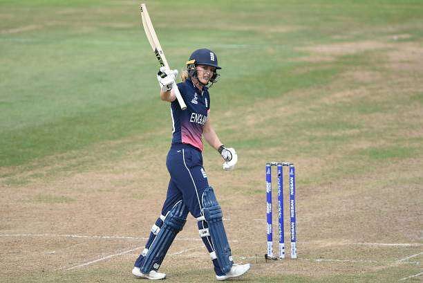 BRISTOL, ENGLAND - JULY 18: Sarah Taylor of England raises her bat after scoring 50 runs during the Semi-Final ICC Women&#039;s World Cup 2017 match between England and South Africa at The Brightside Ground on July 18, 2017 in Bristol, England. (Photo by Nathan Stirk/Getty Images)