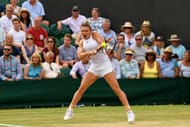 LONDON, ENGLAND - JULY 10: Simona Halep of Romania plays a backhand during the Ladies Singles fourth round match against Victoria Azarenka of Belarus on day seven of the Wimbledon Lawn Tennis Championships at the All England Lawn Tennis and Croquet Club on July 10, 2017 in London, England. (Photo by Shaun Botterill/Getty Images)