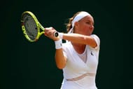 LONDON, ENGLAND - JULY 10: Svetlana Kuznetsova of Russia plays a backhand during the Ladies Singles fourth round match against Agnieszka Radwanska of Poland on day seven of the Wimbledon Lawn Tennis Championships at the All England Lawn Tennis and Croquet Club on July 10, 2017 in London, England. (Photo by Clive Brunskill/Getty Images)