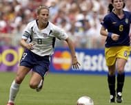United States midfielder Kristine Lilly drives to the goal. The U. S. defeated Sweden 3 - 1 in the opening round of the FIFA Women's 2003 World Cup (Photo by A. Messerschmidt/Getty Images)