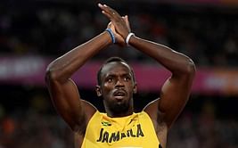 Bolt digs in to advance to 100m semis