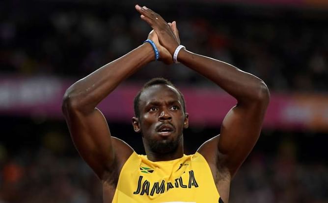 Bolt digs in to advance to 100m semis