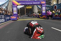 Athletics: Kirui wins world marathon title after duel with Tola