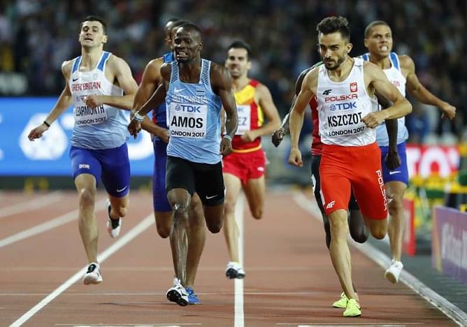 Athletics: Amos stumbles into 800m final