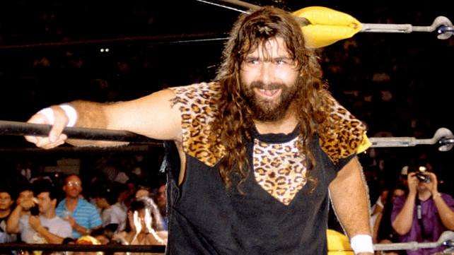 Cactus Jack spat on his WCW Tag-Team Championship title and threw it down