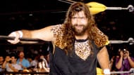 Cactus Jack spat on his WCW Tag-Team Championship title and threw it down