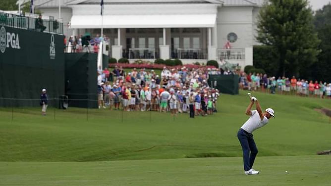 From no-one to the world – Stuart Deane enjoys practice with Dustin Johnson