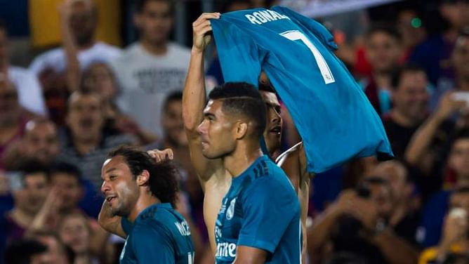 Ronaldo mocks Messi with shirt celebration at Camp Nou