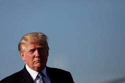 Trump urges NFL to ban players kneeling during anthem