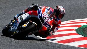 Dovizioso pips Marquez in wet practice at Motegi