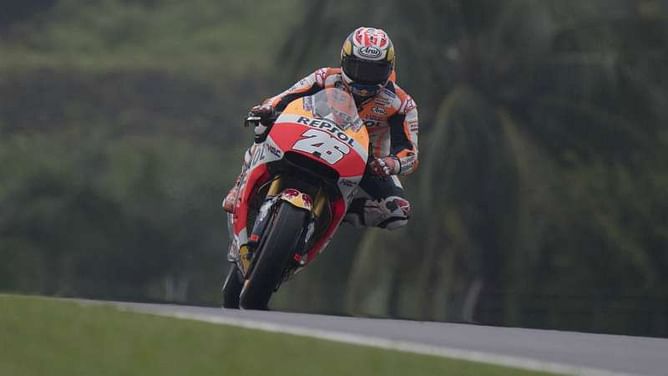 Pedrosa snatches pole as Marquez crashes in Sepang