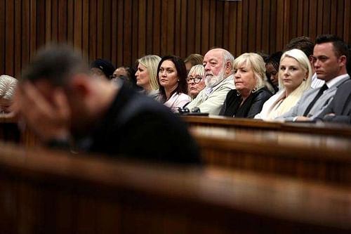 Reeva Steenkamp's parents, June and Barry Steenkamp, look on as Oscar Pistorius reacts during the third day of his resentencing hearing for the 2013 murder of his girlfriend Reeva, in the North Gauteng High Court in Pretoria, South Africa June 15, 2016. REUTERS/Alon Skuy/Pool/Files