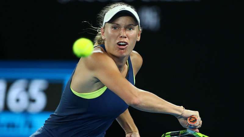 Wozniacki wins gripping Kerber contest to keep No.1 spot