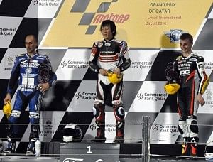 Tomizawa (middle) on the podium at the 2010 