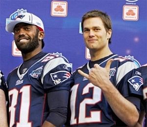 Randy Moss with Tom Brady 