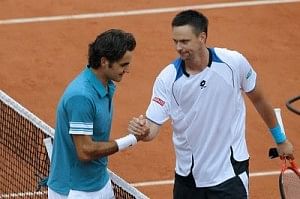 Robin Soderling and Roger Federer at the French Open