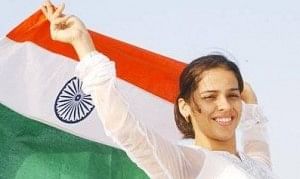 Saina Nehwal with the Indian flag